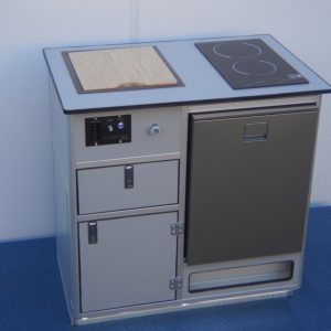 All-in-one self-contained camper van kitchen unit with sink, induction cooktop, fridge, and water system for Sprinter van conversion